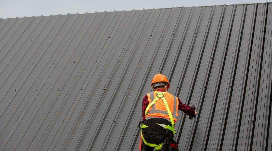 Professional metal roof installation services in Monroe, IA
